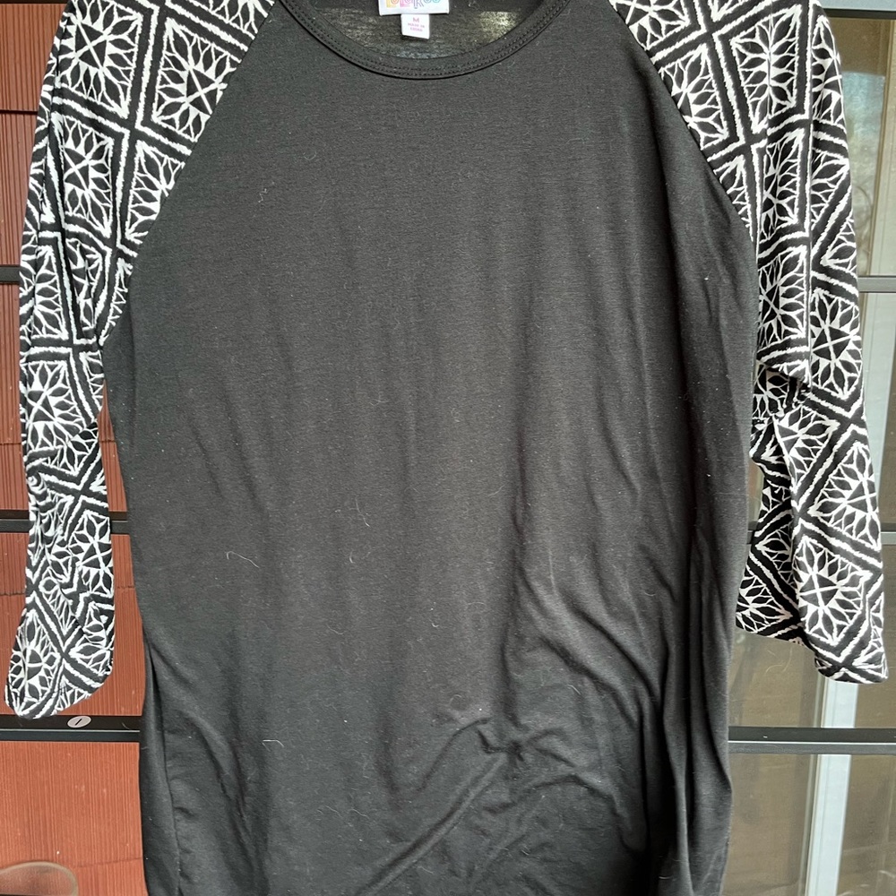 Lularoe Black with Black and White Pattern Sleeves